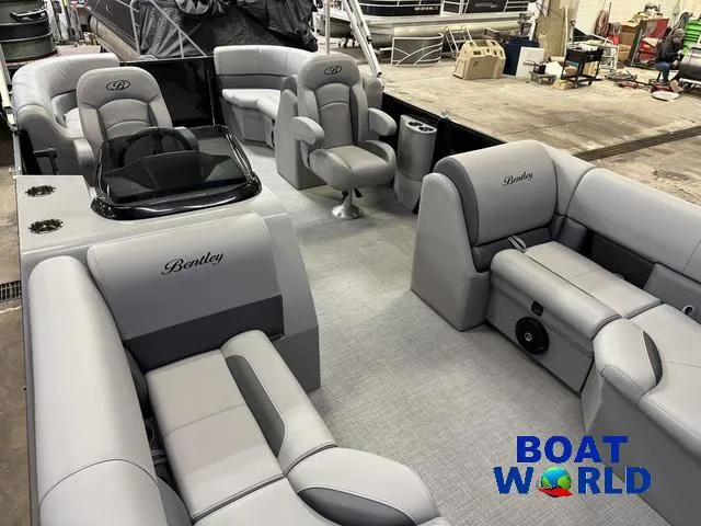Slide: The Image of 2025 Bentley Pontoons Legacy 200 Navigator Quad Lounge interior with luxurious seating and modern design. - 30
