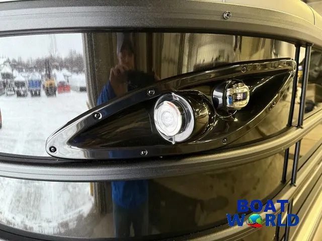 Slide: The Image of Close-up of 2025 Bentley Pontoons Legacy 200 Navigator Quad Lounge headlight design. - 32