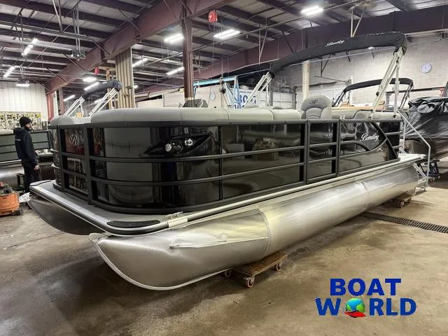 Slide: The Image of 2025 Bentley Pontoons Legacy 200 Navigator Quad Lounge in a warehouse setting. - 33