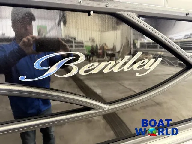 Slide: The Image of 2025 Bentley Pontoons Legacy 200 Navigator Quad Lounge with Honda 4-Stroke logo detail. - 35