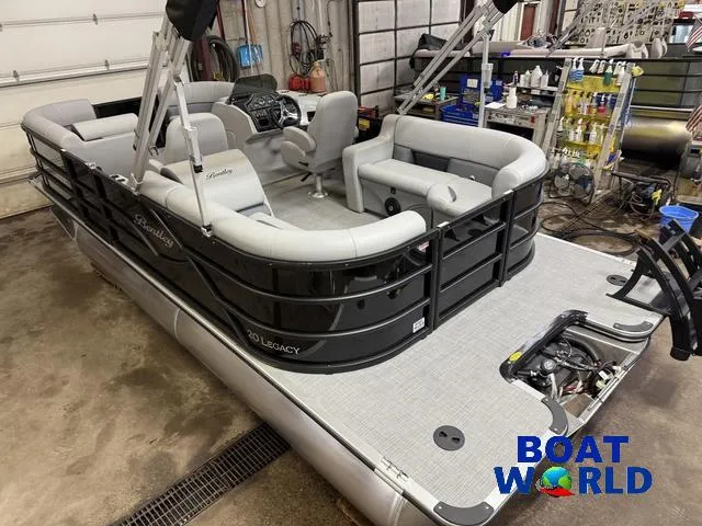 Slide: The Image of 2025 Bentley Pontoons Legacy 200 Navigator Quad Lounge in a workshop setting. - 37