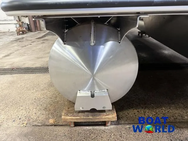 Slide: The Image of 2025 Bentley Pontoons Legacy 200 Navigator Quad Lounge pontoon detail in a garage setting. - 38