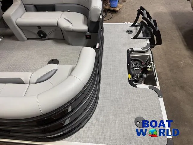 Slide: The Image of 2025 Bentley Pontoons Legacy 200 Navigator interior with quad lounge seating and Honda 4-stroke engine. - 6