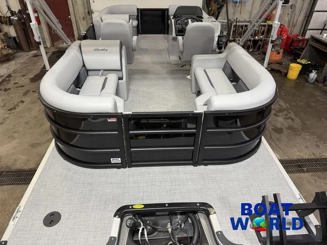 Slide: The Image of 2025 Bentley Pontoons Legacy 200 Navigator Quad Lounge interior with Honda 4-Stroke engine. - 7