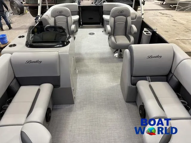 Slide: The Image of 2025 Bentley Pontoons Legacy 200 Navigator Quad Lounge interior with luxurious seating. - 8