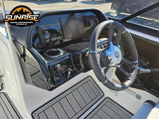 Slide: The Image of 2025 Yamaha Boats 195S dashboard with steering wheel and control panel. - 11