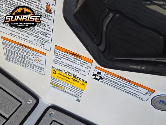 Slide: The Image of Warning labels and capacity information on a 2025 Yamaha Boats 195S, maximum 8 persons or 1280 lbs. - 14
