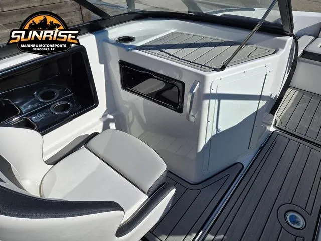 Slide: The Image of 2025 Yamaha Boats 195S interior with seating and storage, featuring sleek design and modern amenities. - 15