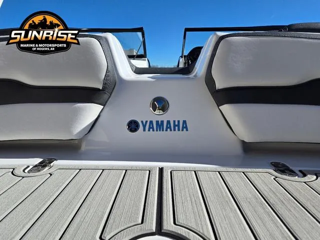 Slide: The Image of 2025 Yamaha Boats 195S, rear view, featuring sleek design and logo, showcased by Sunrise Marine. - 25