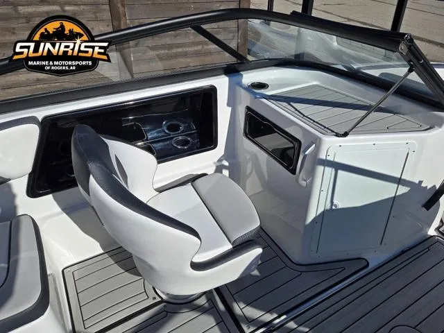 Slide: The Image of 2025 Yamaha Boats 195S on a serene lake with lush greenery. - 5