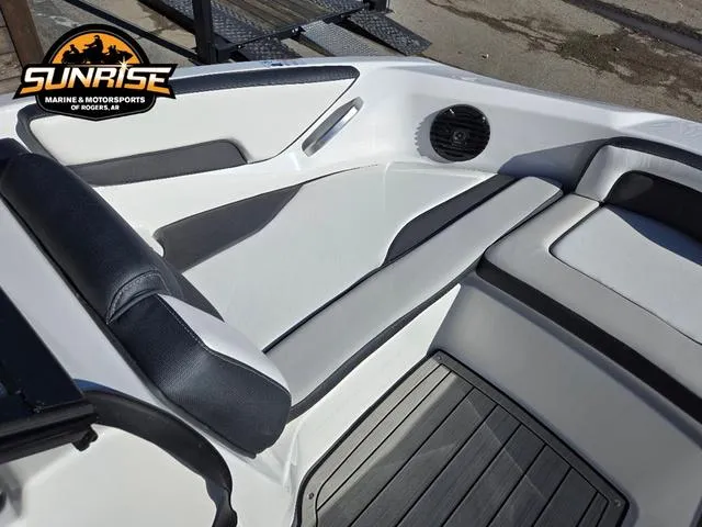 Slide: The Image of Family disembarking from a 2025 Yamaha Boats 195S at a lakeside dock. - 7