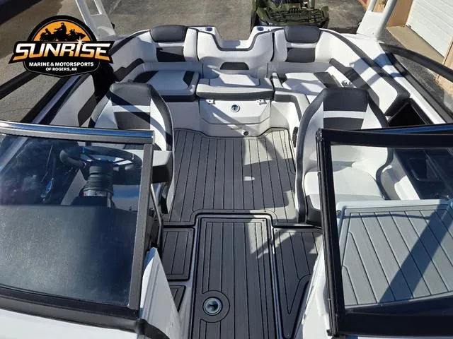 Slide: The Image of 2025 Yamaha Boats 195S, sleek white design, side view. - 8