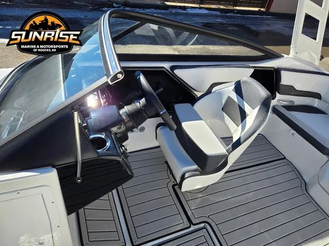 Slide: The Image of 2025 Yamaha Boats 195S interior with sleek design and modern steering console. - 9