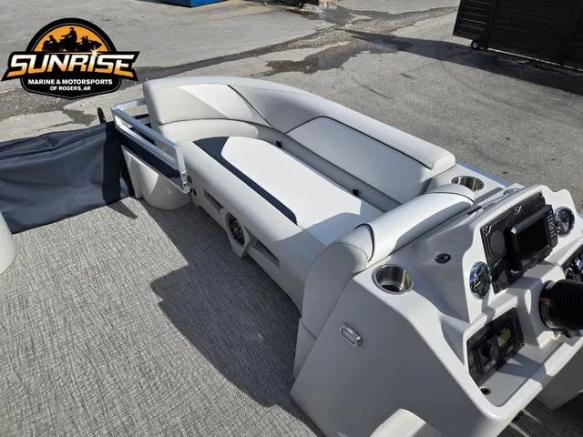 Slide: The Image of 2025 Avalon 21' Venture 85 Platinum Rear Fish boat interior with seating and control panel. - 12
