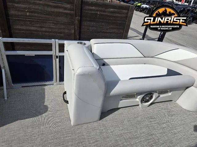 Slide: The Image of 2025 Avalon 21' Venture 85 Platinum Rear Fish boat interior with white seating and speaker. - 13