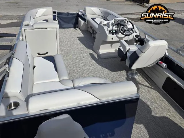 Slide: The Image of 2025 Avalon 21' Venture 85 Platinum Rear Fish boat interior with seating and steering console. - 17