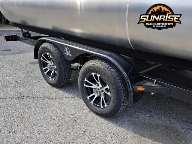 Slide: The Image of Trailer of 2025 Avalon 21' Venture 85 Platinum Rear Fish boat with dual wheels. - 22