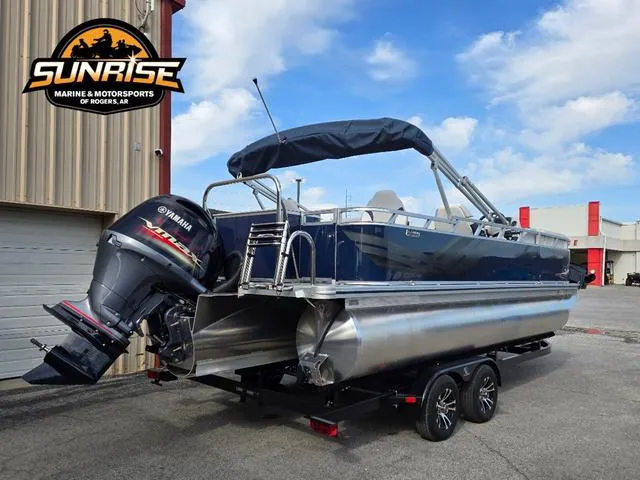 Slide: The Image of 2025 Avalon 21' Venture 85 Platinum Rear Fish boat with Yamaha motor, parked outdoors. - 23