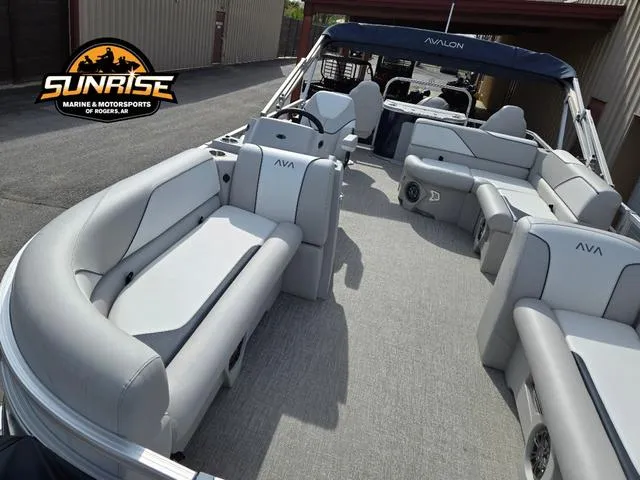 Slide: The Image of 2025 Avalon 21' Venture 85 Platinum Rear Fish boat with spacious seating and modern design. - 5