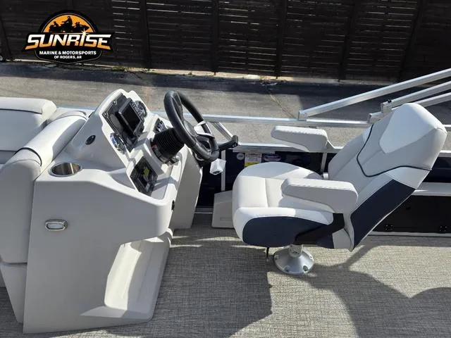 Slide: The Image of 2025 Avalon 21' Venture 85 Platinum Rear Fish boat interior with steering console and captain's chair. - 8