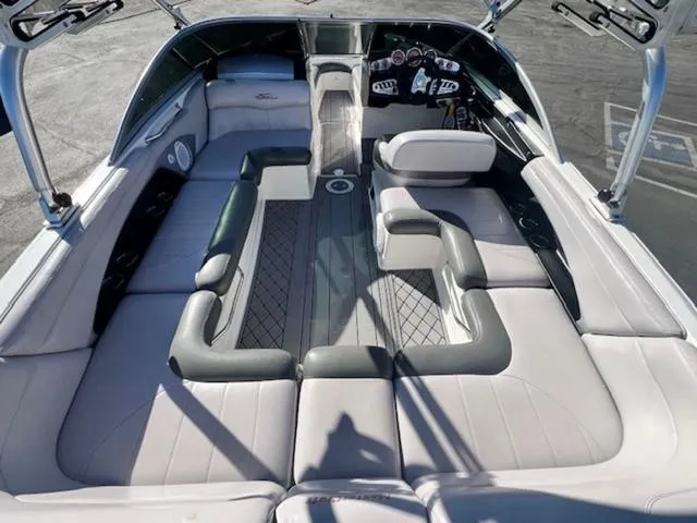 Slide: The Image of 2006 MasterCraft X45 boat interior with spacious seating and modern dashboard. - 10