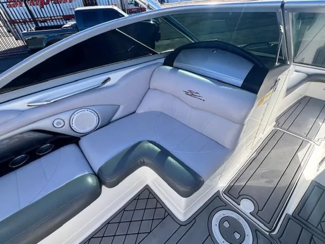 Slide: The Image of 2006 MasterCraft X45 boat interior with gray seating and modern design. - 12