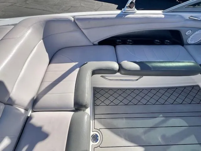 Slide: The Image of 2006 MasterCraft X45 boat interior with cushioned seating and sleek design. - 14