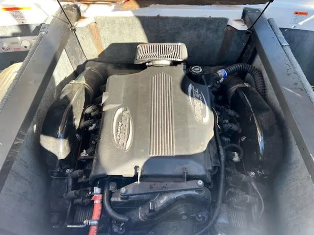 Slide: The Image of 2006 MasterCraft X45 engine compartment with visible components and wiring. - 21