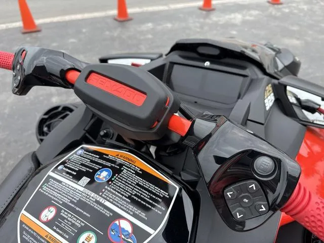 Slide: The Image of Close-up of 2025 Sea-Doo Waverunner PWC RXP X 325 handlebars and controls. - 11