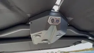 Slide: The Image of 2024 Malibu M242 boat interior ceiling with control panel. - 7