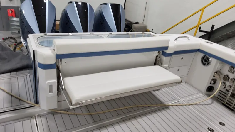 Slide: The Image of 2025 Formula 387 Center Console Fish boat with foldable seating and triple engines. - 10