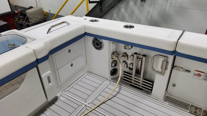 Slide: The Image of 2025 Formula 387 Center Console Fish boat interior with storage and utility features. - 11