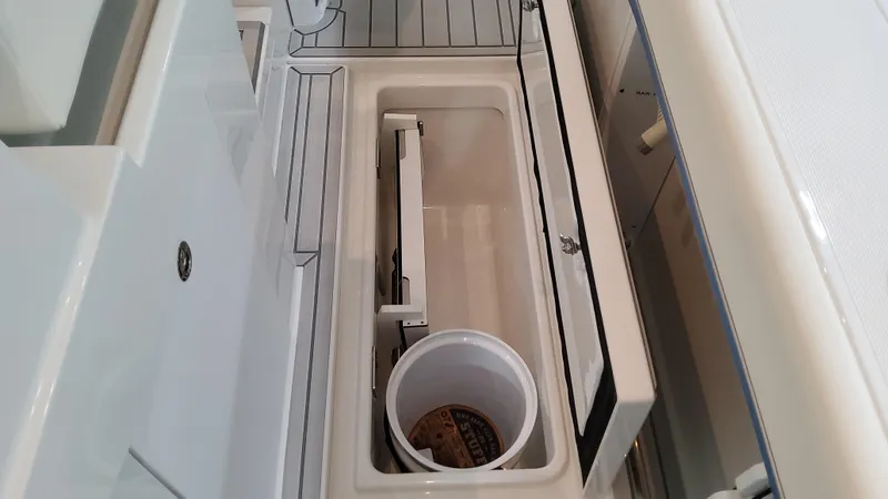 Slide: The Image of 2025 Formula 387 Center Console Fish boat interior storage compartment. - 19