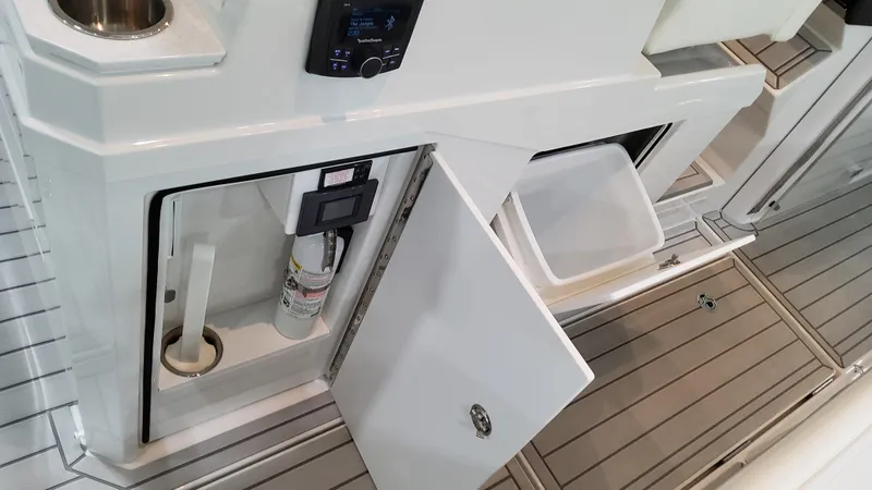 Slide: The Image of 2025 Formula 387 Center Console Fish boat interior storage compartments. - 21