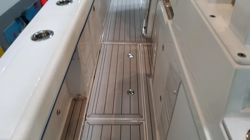 Slide: The Image of 2025 Formula 387 Center Console Fish boat interior with sleek, modern design and spacious deck. - 24