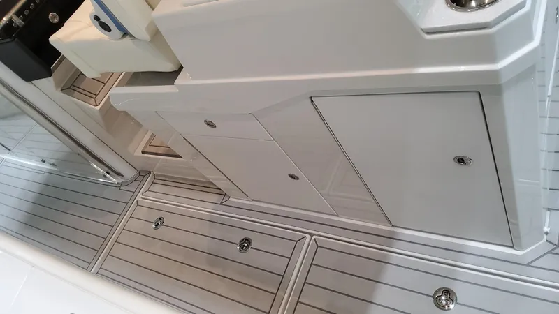 Slide: The Image of 2025 Formula 387 Center Console Fish boat interior with sleek, modern design and storage compartments. - 26