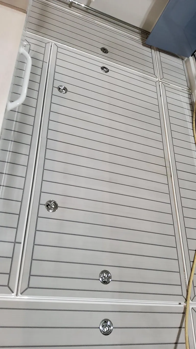 Slide: The Image of 2025 Formula 387 Center Console Fish deck with sleek, modern design and secure fittings. - 28