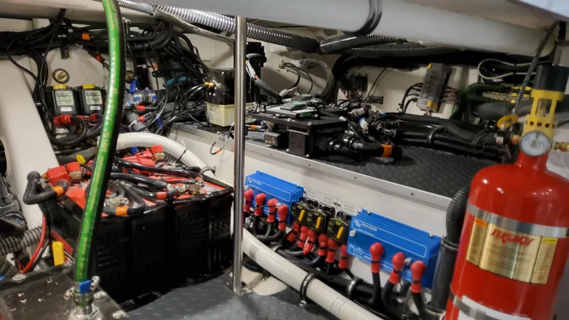 Slide: The Image of Engine room of 2025 Formula 387 Center Console Fish, showcasing wiring and equipment. - 31