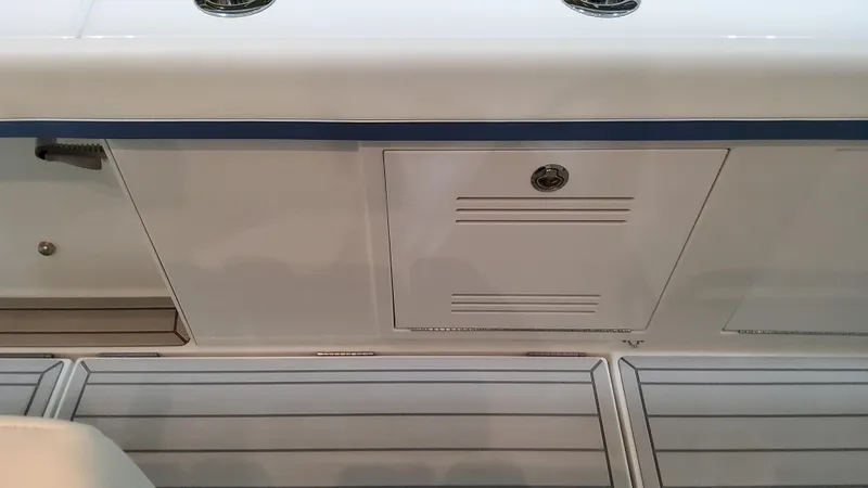 Slide: The Image of 2025 Formula 387 Center Console Fish boat deck and storage compartment. - 41