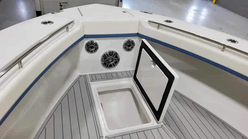 Slide: The Image of 2025 Formula 387 Center Console Fish boat interior with open storage compartment. - 46