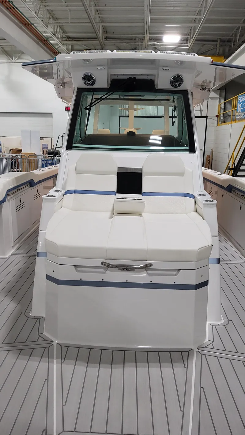 Slide: The Image of 2025 Formula 387 Center Console Fish boat interior, featuring sleek design and modern amenities. - 49