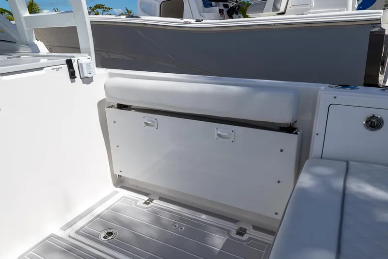 Slide: The Image of Interior seating of 2025 Sea Fox 288 Traveler boat, featuring sleek white design. - 11
