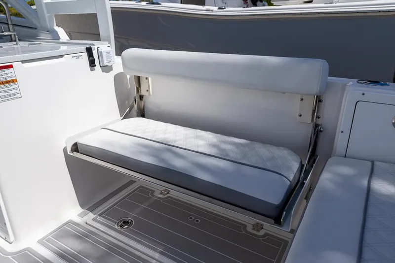 Slide: The Image of 2025 Sea Fox 288 Traveler boat with foldable bench seat and sleek interior design. - 12