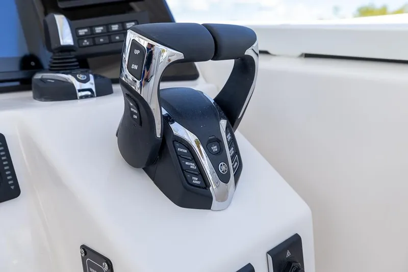 Slide: The Image of Yamaha throttle control on 2025 Sea Fox 288 Traveler boat dashboard. - 21