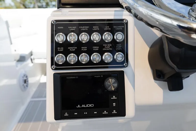 Slide: The Image of Control panel of 2025 Sea Fox 288 Traveler boat with JL Audio system. - 22