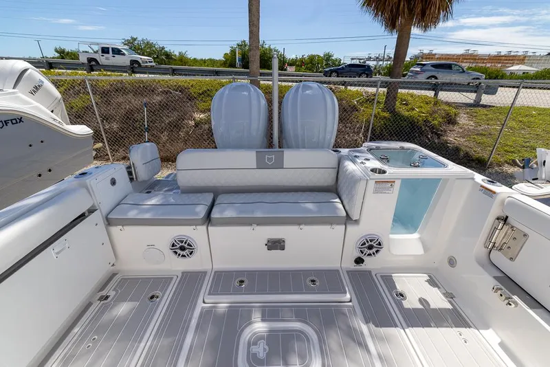 Slide: The Image of 2025 Sea Fox 288 Traveler boat interior with seating and storage compartments. - 7