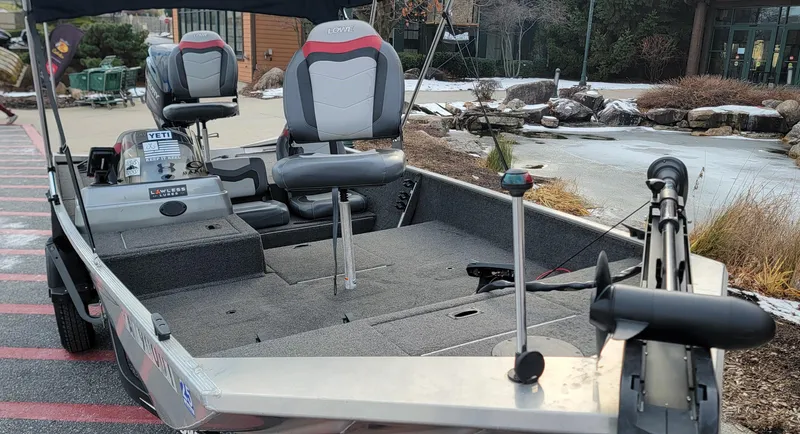 Slide: The Image of 2017 Lowe Stryker 17 fishing boat with dual seats and trolling motor. - 4