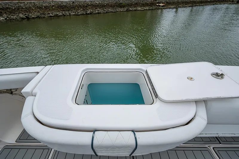 Slide: The Image of Tiara Yachts 3600 Open 2013, open storage compartment on deck by the water. - 8