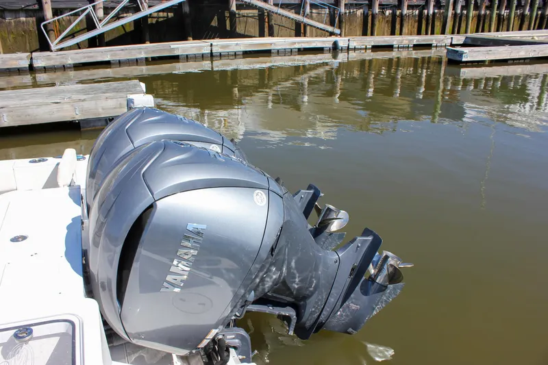 Slide: The Image of Twin Yamaha outboard engines on a 2023 Sea Hunt Gamefish 27 with Coffin Box. - 14
