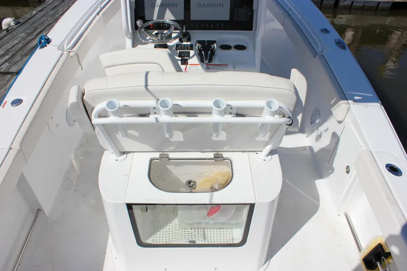 Slide: The Image of 2023 Sea Hunt Gamefish 27 boat interior with coffin box and rod holders. - 24